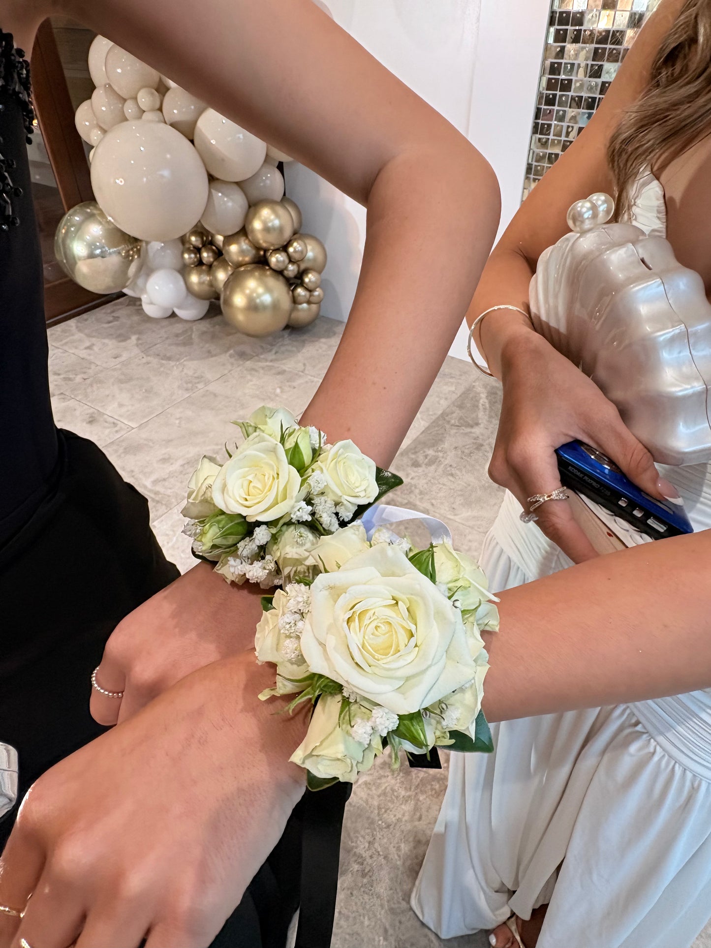 White spray rose corsages 